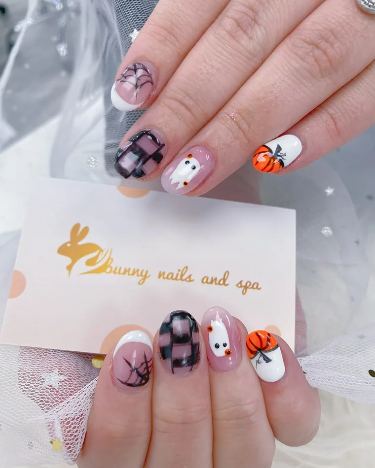 Halloween set with ghosts, pumpkins, spiderwebs and black plaid tips