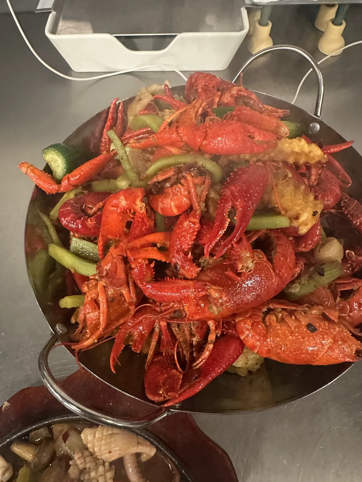Spicy crayfish piled high with chili peppers