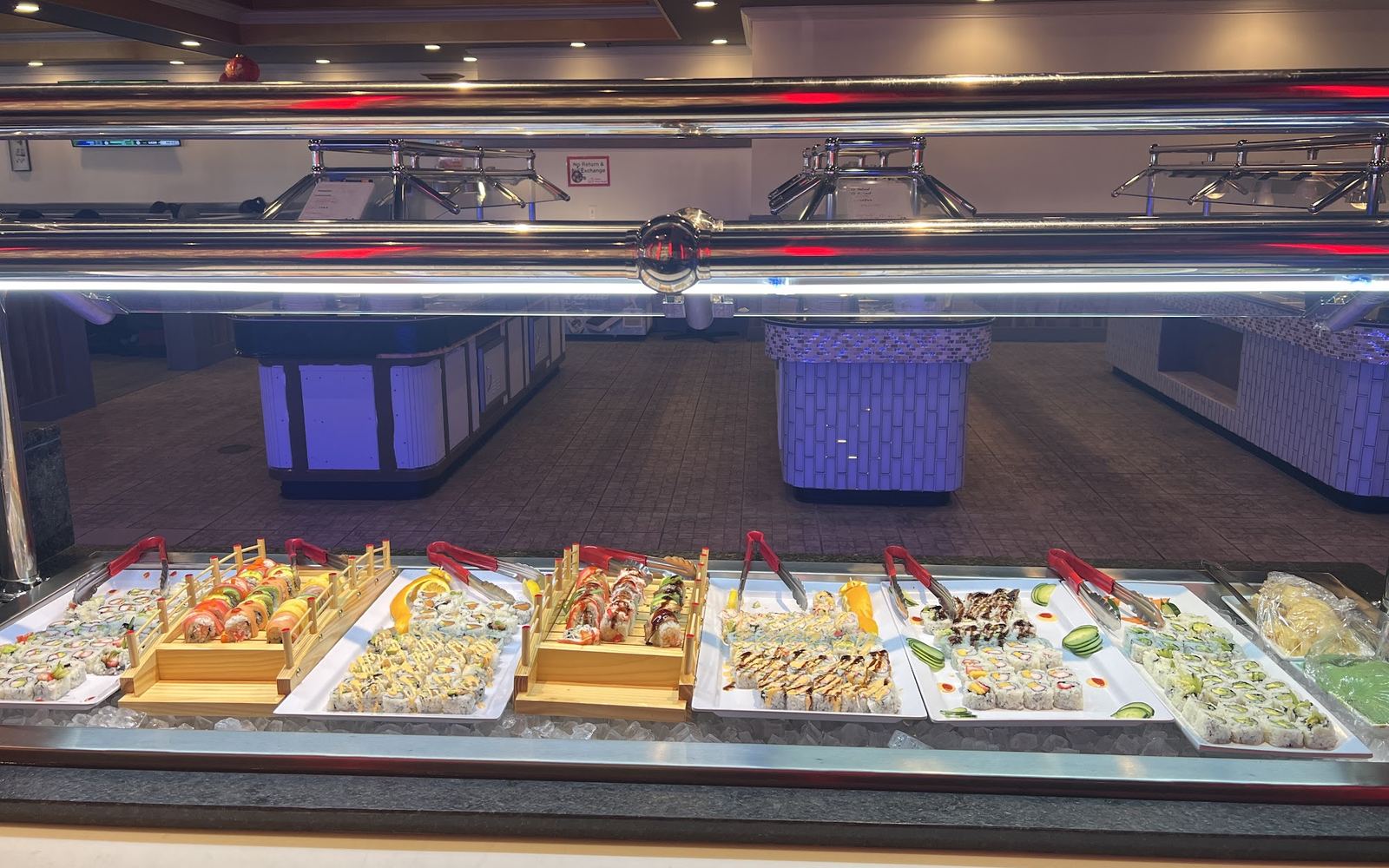 The sushi bar and buffet islands inside Golden Palace Buffet