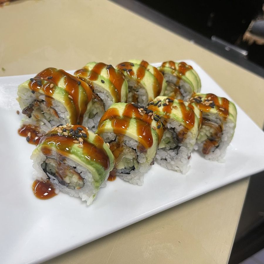 Sushi rolls with eel sauce