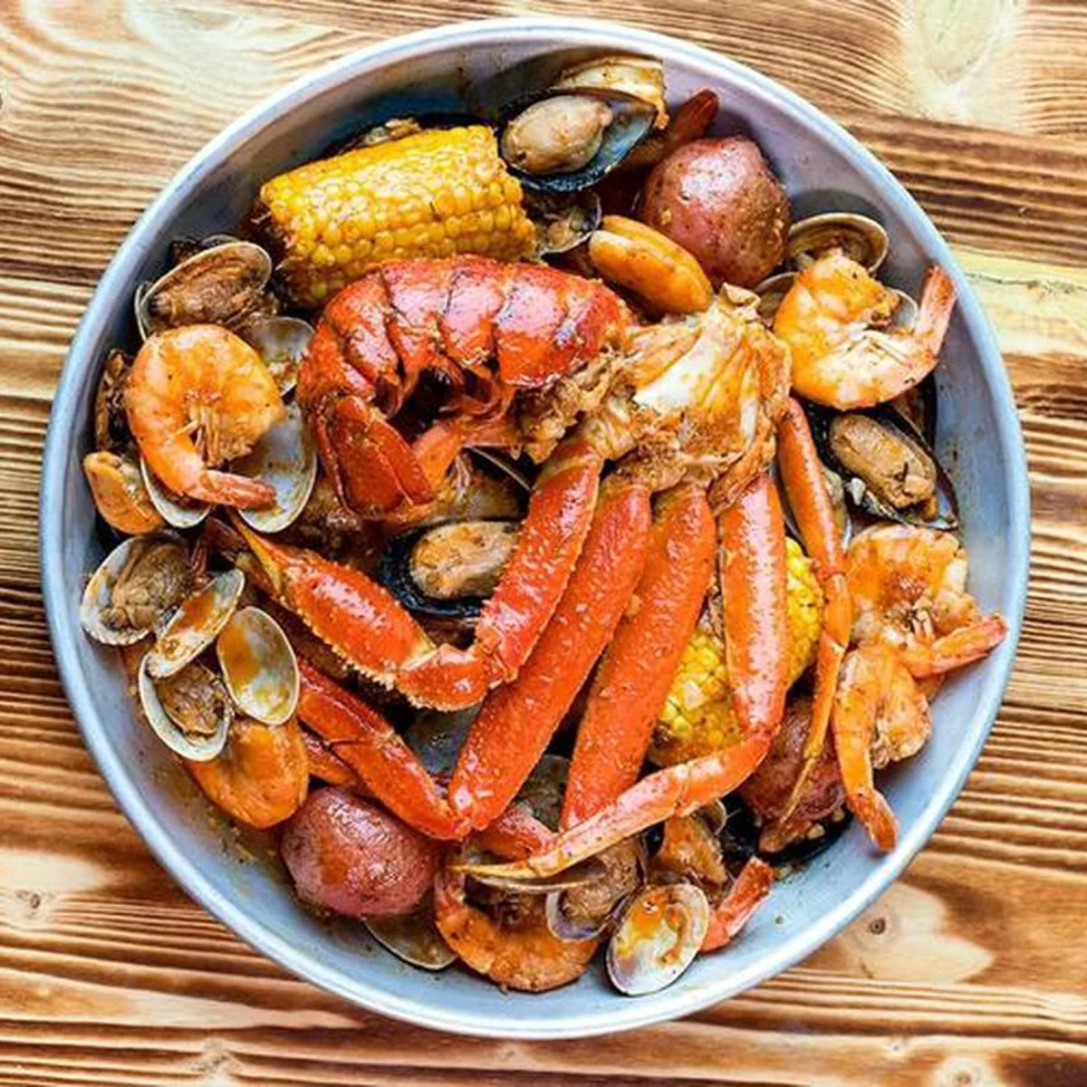 The Reel's Catch: snow crab legs, shrimp, clams, mussels, corn and potatoes