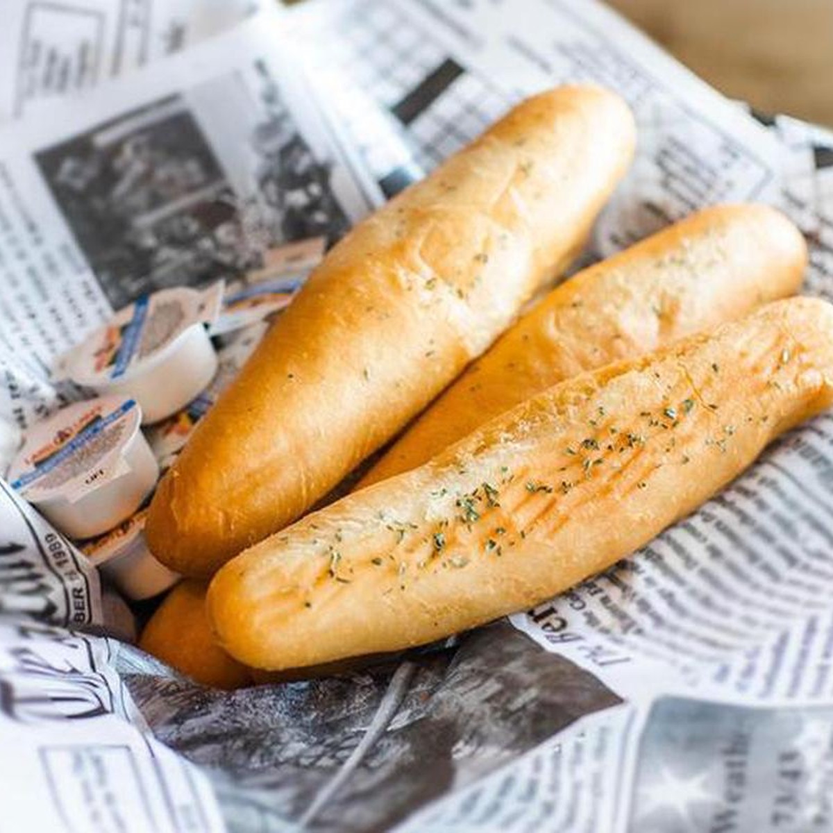 Garlic Breadsticks (4) — Hook & Reel Cajun Seafood & Bar