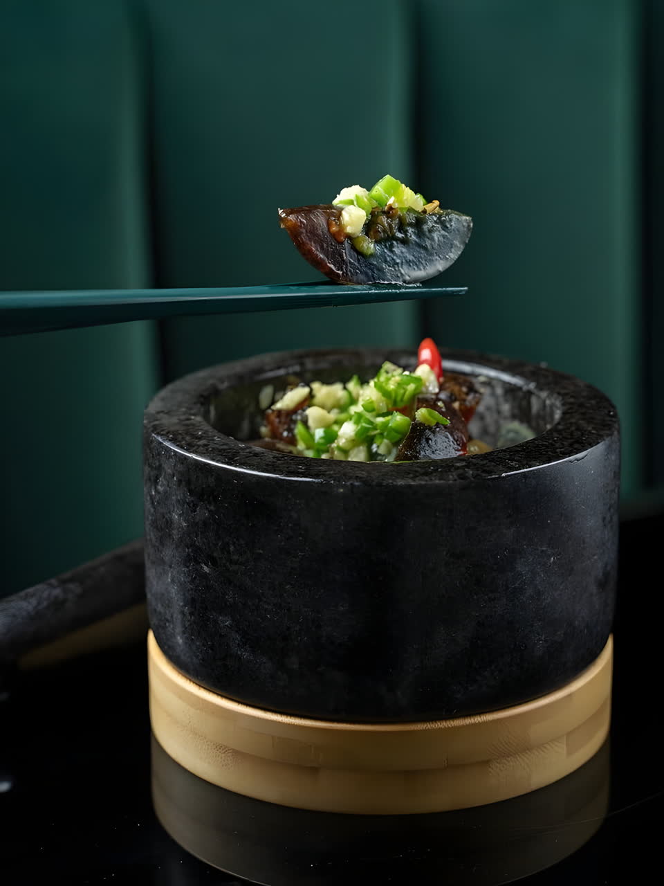 A cold appetizer served in a stone mortar