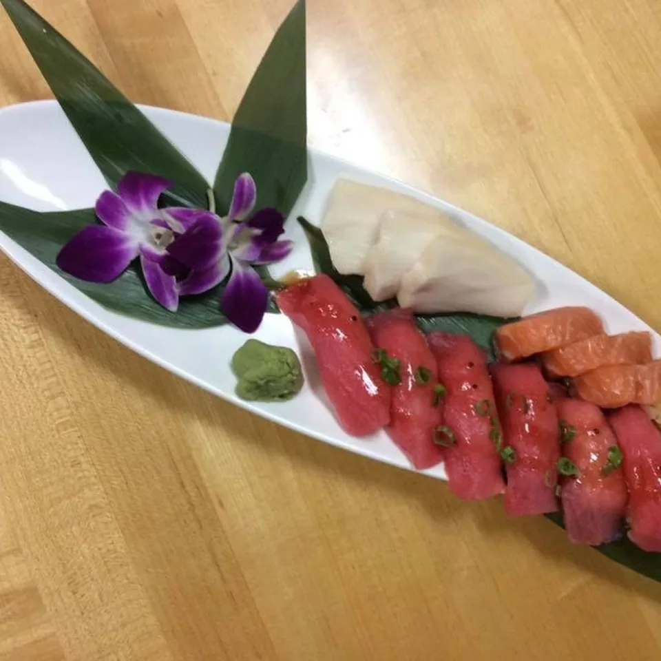 Sushi and sashimi deluxe plate with tuna, salmon and white fish