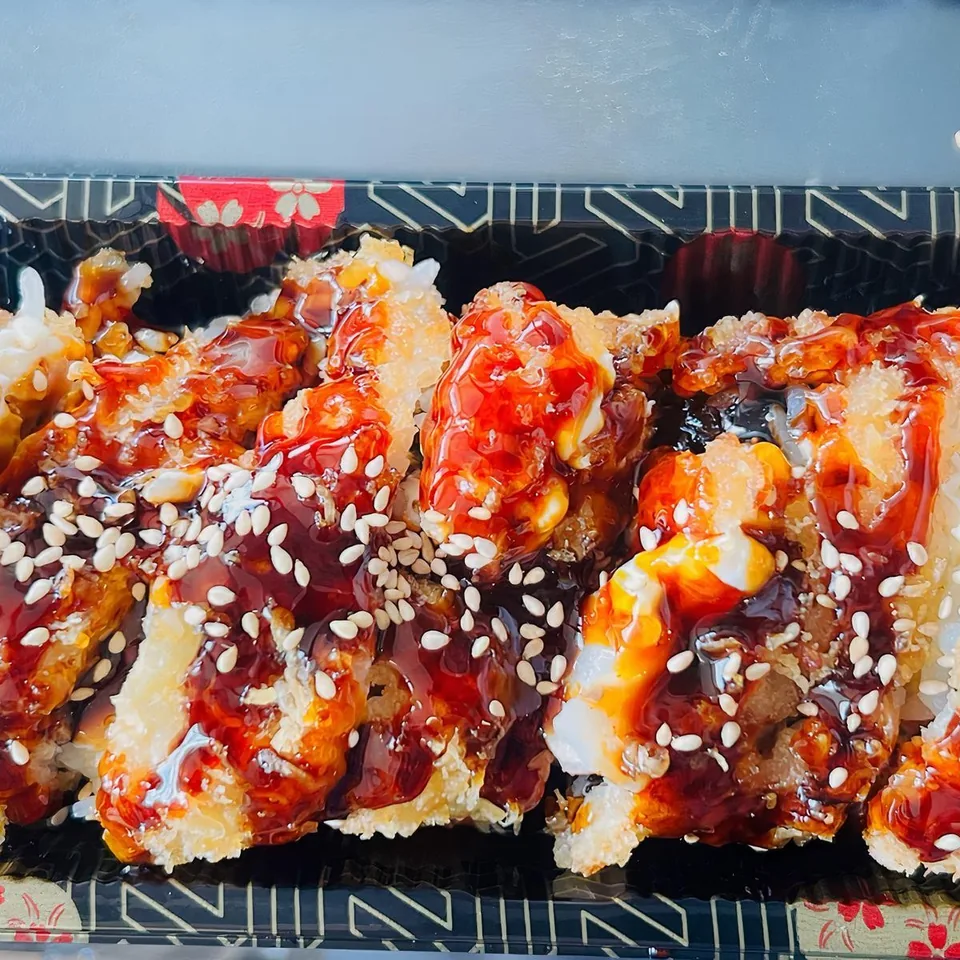Dynamite roll, deep-fried and drizzled with eel sauce