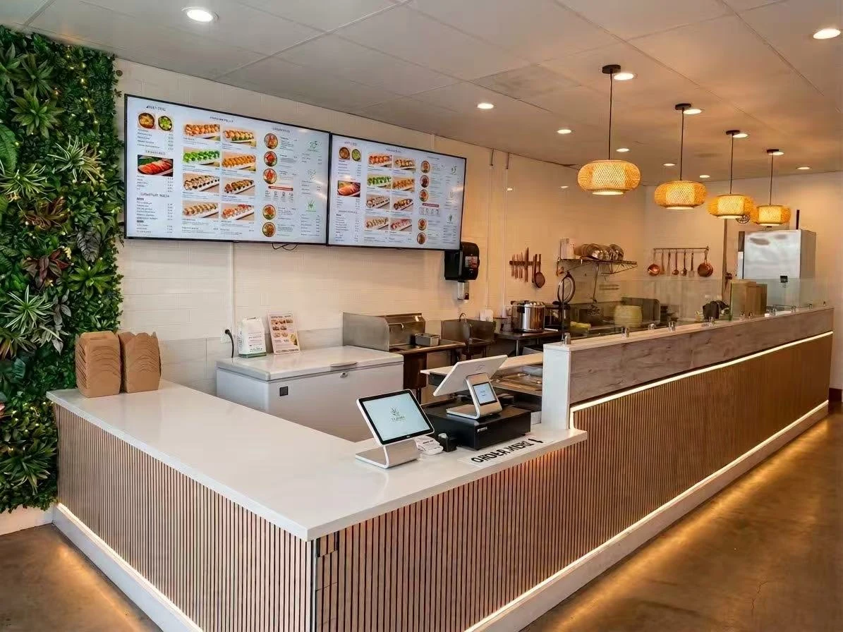 The Sushi Factory Poki counter and bright dining space